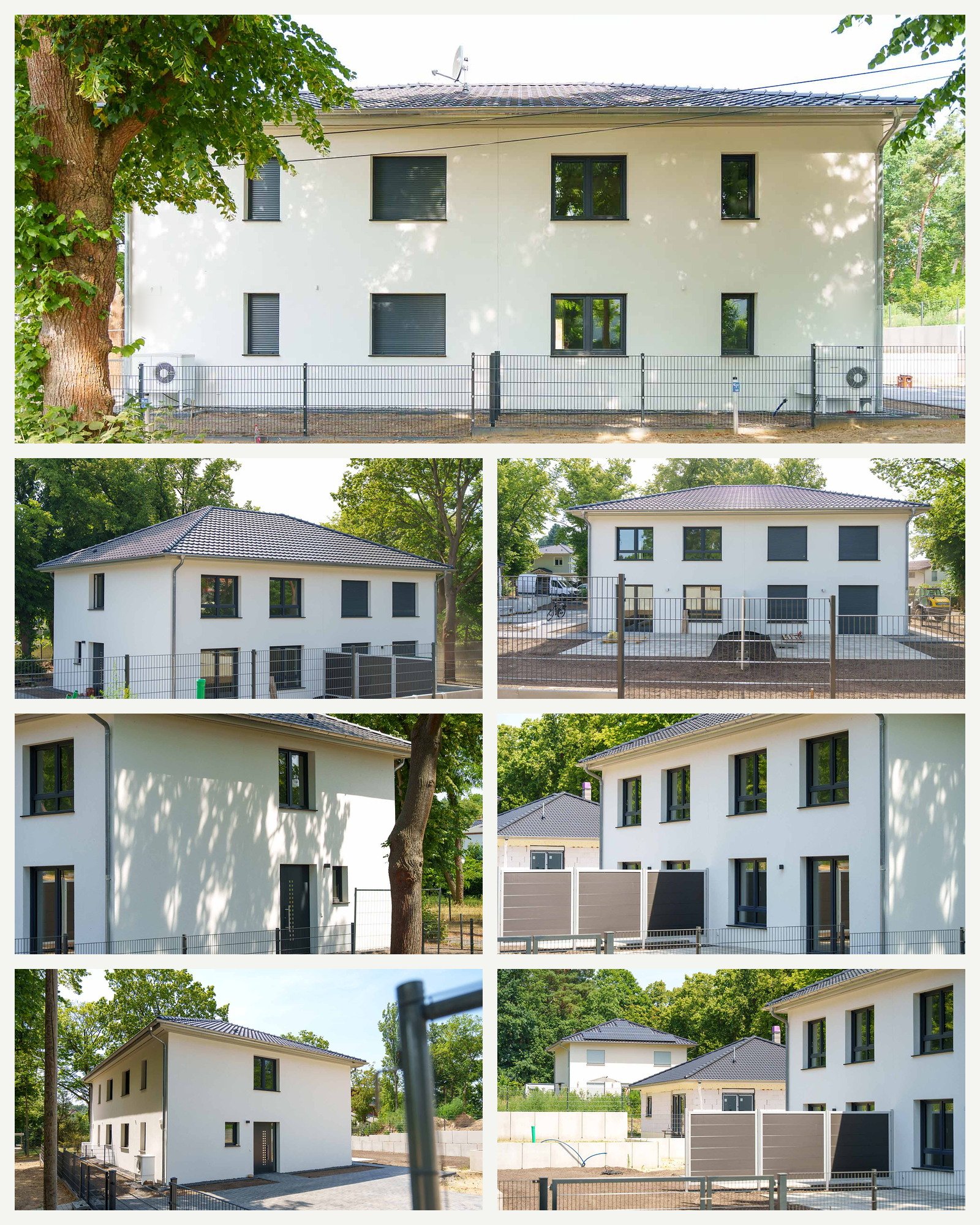 Fertige helle Fassade mit anthrazitfarbenen Fenstern und Rollläden